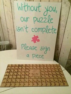 a sign that says without you, our puzzle isn't complete please sign a piece