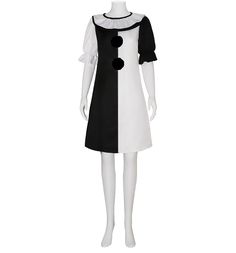 a female mannequin wearing a black and white dress