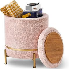 a pink storage container with wheels holding items