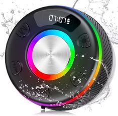 an alarm clock with water splashing around it