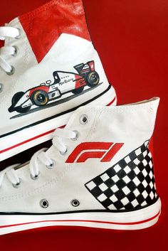 "⭐ FREE SHIPPING ⭐ These hand painted Formula 1 custom shoes are available in adult men's sizes. You can send initial letters or name, we will add in the design where \"NS\" written. If you are a fan of Formula One or your loving bro, boyfriend, or husband then this will surely be a great addition to his shoe rack. Add your personalization: If you want to add some personal touch to this design, do let us know at the time of ordering in the \"Note\" section. Design a custom pair of your choice to F1 Custom Shoes, Gifts For Formula One Fans, Shoe Collection Sneakers, F1 Gift Ideas Diy, Ferrari Shoes, Design Shoes, Formula One Merch, Shoes Custom, Formula 1 Gift Ideas