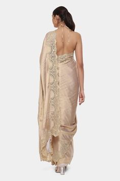 Gold saree with floral embroidered border. Comes along with running blouse piece. - Aza Fashions Elegant Lace Work Pre-draped Saree For Reception, Elegant Pre-draped Saree With Lace Work For Reception, Elegant Pre-draped Saree With Lace Work, Elegant Fitted Pre-draped Saree With Lace Work, Fitted Pre-draped Saree With Lace Work For Wedding, Elegant Designer Saree With Lace Work, Elegant Saree With Lace Work, Fitted Pre-draped Saree With Lace Work, Gold Saree