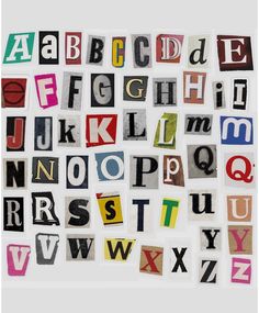 the letters and numbers are made up of different types of stickers, including one that is