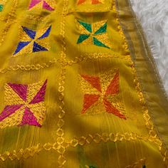 Lightweight Phullkari Phullkari Is Punjabi Style Duppata Color: Yellow Condition: Brand New Festive Yellow Traditional Wear With Motifs, Festive Multicolor Embroidered Self Design Fabric, Yellow Kurta With Motifs For Diwali, Bollywood Style Yellow Dupatta With Motifs, Festive Yellow Kurta With Motifs, Yellow Dupatta With Dori Work For Celebration, Bohemian Style Festive Dupatta With Self Design, Yellow Dupatta For Festivals And Celebrations, Yellow Celebration Dupatta With Traditional Drape