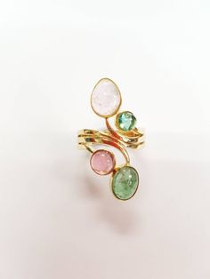 This ring is one of my favorite in my collection. It's consist of 4 pink and green tourmaline in cabochon cut set in 18K yellow gold.  This ring can be altered 3 sizes up or down from size 6. This is one of a kind design, and reproduction will not be possible.   Items will be sent via registered mail. If you  prefer other modes of posting, please feel free to send me a message. Blossoming Flower, Polished Gemstones, Cabochon Ring, Tourmaline Ring, Stone Design, Multi Stone Ring, Green Tourmaline, Multi Stone, Jewellery Collection