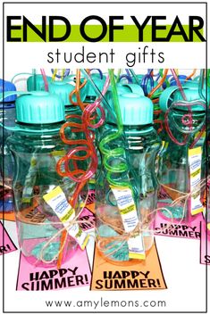 the end of year student gifts are in bottles with colorful streamers and tags on them