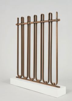 a metal rack with four long bars on it's sides and two small ones in the middle