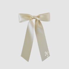 The Zoe petite satin ribbon hair bow is a slimmer version of the Zoe bow, perfect for fashion-forward girls of all ages. This bow adds a playful touch to any outfit. Look cute and stylish with the Zoe Petite Bow! * Satin ribbon * Bow 5.5" W x Tails 7.25" L * Alligator clip with a no-slip grip | French barrette | Elastic hair tie * Handmade in the USA * Small women-owned business *Please note that bows are handcrafted and may vary slightly in size and look. Measurements are approximate. **NEVER leave children unattended or sleeping while wearing ANY hair accessories from Your Final Touch. Products may contain parts that can pose a choking hazard or strangulation Satin Hair Bow, Girl Hair Accessories, Satin Ribbon Bow, Bride Hair, Bride Hair Accessories, Ribbon Hair Bows, French Barrette, Small Women, Elastic Hair Ties