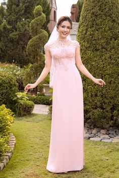 Lovely pink short sleeves bridal ao dai – LAHAVA Fitted Pink Gown With Illusion Neckline, Wedding Dress With Illusion Neckline And Cap Sleeves, Short Sleeve Evening Dress With Illusion Neckline For Wedding, Elegant Pink Gown With Illusion Neckline, Fitted Pink Ao Dai For Ceremony, Pink Fitted Ao Dai For Ceremony, Pink Short-sleeved Evening Dress For Wedding, Pink Short Sleeve Evening Dress For Wedding, Wedding Gown With Illusion Neckline And Short Sleeves