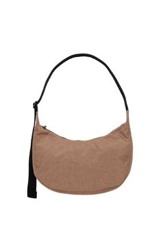 Practical doesn’t have to be boring. Baggu's Medium Nylon Crescent Bag is effortlessly casual and large enough to carry more than just the essentials. Wear it slung over your shoulder or crossbody for a hands-free experience. Complete with two interior pockets that make it easy to stay organized. DETAILS SIZE Measures 8" × 13 ¾" × 4" with 37 ½" adjustable logo strap MATERIAL Recycled heavyweight nylon, recycled ripstop nylon lining CARE Machine washable Casual Nylon Hobo Bag For On-the-go, Nylon Hobo Shoulder Bag For On-the-go, Brown Nylon Shoulder Bag With Zipper Pocket, Brown Nylon Shoulder Bag With Pockets, Beige Nylon Shoulder Bag With Adjustable Strap, Nylon Hobo Bag With Adjustable Strap, Brown Nylon Shoulder Bag For Daily Use, Beige Nylon Shoulder Bag For On-the-go, Casual Nylon Crossbody Hobo Bag