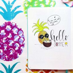 a notebook with an image of a pineapple on it and the words hello summer