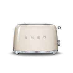 a pink toaster with the word smeg on it's front and side