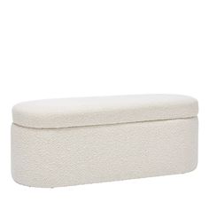 an upholstered white bench on a white background