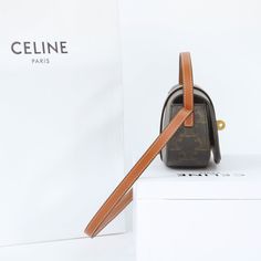 Size: 18cm*8cm*5cm It comes with Dust box, Care manual, Tag, and Paper bag. Gift Top Handle Baguette Bag With Detachable Strap, Modern Top Handle Baguette Bag For Gift, Modern Top Handle Baguette Bag As Gift, Designer Brown Box Bag For Mobile Phone, Gift Leather Rectangular Baguette Bag, Leather Rectangular Baguette Bag For Gift, Chic Rectangular Baguette Bag As A Gift, Brown Rectangular Baguette Bag Gift, Brown Rectangular Baguette Bag As Gift