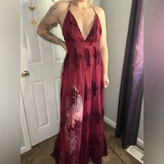 Bella Ella Boutique Formal Dress Wine Colored Very Flattering Slits On Both Sides Open Back Brand New With Tags Bohemian Split Dress For Party, Bohemian Split Party Dress, Burgundy Maxi Dress For Party, Burgundy Backless Dress For Date Night, Burgundy Maxi Dress For Date Night, Bohemian Split Maxi Dress For Party, Bohemian Party Maxi Dress With Split, Spring Burgundy Maxi Dress For Date Night, Burgundy Floor-length Dress For Night Out