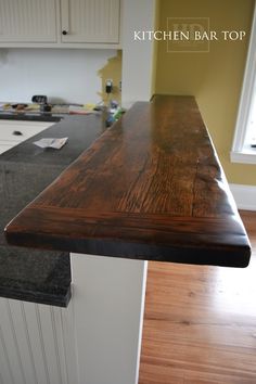 the counter top is made out of wood