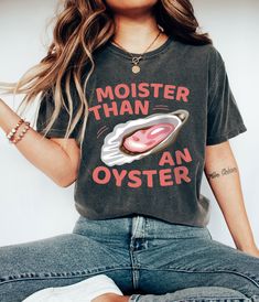 Add a splash of humor to your wardrobe with the 'Moister Than An Oyster' Shirt! This retro-inspired graphic tee combines quirky humor with a laid-back style, making it the perfect conversation starter. Ideal for those who love unique and fun apparel, this shirt is a great gift idea for friends or anyone with a playful sense of humor. With its trendy design and casual fit, it's perfect for everyday wear or as a cool addition to your casual outfits. Stand out with this fun and cheeky graphic tee! Welcome to Authentic Tee! Discover  your  dream style in our store, where we offer unique designs through DTF printing on high-quality apparel. Our soft and comfortable shirts are printed, pressed and shipped to you from our boutique. Enjoy your shopping!🛍️ ✔️Please make sure you check our size car Novelty Tops With Funny Print And Relaxed Fit, Quirky Humor, Retro Funny, Retro Humor, Dtf Printing, Funny Graphic Tees, Custom Sweatshirts, Dream Style, Laid Back Style