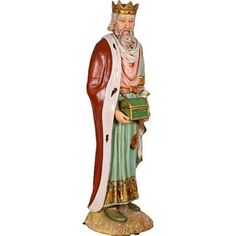 a statue of an old man wearing a crown and holding a green box with gold trim