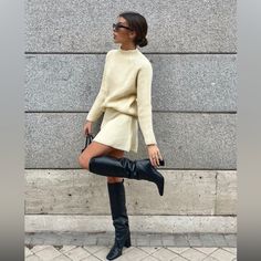 Zara Nigh Waist Knitted Skirt Fall Skirts And Boots, Knitted Mini Skirt Outfit, Winter Knee-length Knit Skirt, Zara Chic Chunky Knit Sweater, Skirt With Thigh High Boots, Chic Zara Chunky Knit Sweater, Chic Knee-length Sweater For Winter, Sweater Skirt Boots Outfit, Chic Knit Skirt For Winter