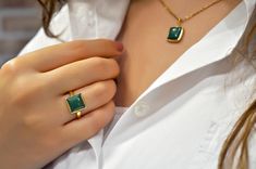 Noble, feminine, special ... Extraordinary, square ring with a green colored jade gemstone in a gold-plated 925 sterling silver setting. The geometric shaped ring gives your outfit the perfect addition. The jade healing stone ensures harmony and balance. You can also give the ring away to your loved ones. It is well suited as a Mother's Day present, as a birthday present or as a Christmas present. Of course, you can also give yourself a present! If you would like to combine this piece of jewelery with suitable earrings and necklace you can find them under the following links: https://www.etsy.com/de/listing/1098150310/925-sterling-silber-jade-ohrringe-grun?ref=listings_manager_grid https://www.etsy.com/de/listing/1112082999/925-sterling-silber-kette-mit?ref=listings_manager_grid - Size: ad Modern Yellow Gold Jade Jewelry, Everyday Luxury Green Jewelry, Fine Green Princess Cut Jewelry, Fine Jewelry Green Princess Cut, Modern Jade Ring As A Gift, Green Gold Plated Ring, Modern Jade Jewelry For Anniversary, Modern Gold Emerald Ring Gift, Green Gold-plated Ring