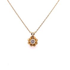 "Vintage 14k yellow gold diamond pendant necklace. The round diamond weighs approximately .30ct and has a beautiful sparkle and shine. The diamond quality is H color and VS2 clarity. The diamond is set in a unique 8 prong tulip setting with hearts and crown designs between the prongs. The 14k gold setting measures 11.3mm in diameter and has a rabbit ear bail. The 14k yellow gold rope link chain measures 1.3mm wide is 16\" long. The pendant with the chain weighs 2.69 grams." Gold 14k Diamond Necklace With Single Diamond, Yellow Gold Brilliant Cut Diamond Flower Pendant Necklace, Gold Brilliant Cut 14k Diamond Necklace, 14k Gold Brilliant Cut Diamond Necklace, 14k Gold Diamond Necklace With Brilliant Cut, Gold Diamond Necklace With Single Diamond, Gold Diamond Necklace With Flower Pendant, Fine Jewelry: 14k Gold Diamond Necklace With Flower Pendant, Fine Jewelry 14k Gold Diamond Flower Pendant Necklace