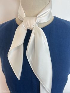 "Plain white natural mulberry silk medium square scarf, size: 65 cm x 65 cm / 26 in x 26 in. Soft, smooth, and lustrous silk charmeuse fabric, breathable and skin-friendly feels very soft and comfortable to wear. Can wear it on both sides which will give different feel and look. Can style in many ways: can wear this scarf as a soft neck scarf, as a hair tie, as a headband scarf, as a wrist scarf, as a purse accessory. Or style it in any way you want with your own sense of creativity! Suitable for all seasons and is a great gift idea for special occasions.  Care Instructions: Pure silk is a type of organic, natural and delicate fabric, please avoid washing if it's not particularly dirty. Gently hand wash cold/lukewarm with mild detergent, natural air dry. Stored in a cool, dry, and dark pla Elegant Solid Color Handkerchiefs For Gifts, Elegant Rectangular Silk Scarf For Spring, Classic Silk Scarf For Spring Formal Events, Classic Spring Scarves For Formal Occasions, Classic Formal Silk Scarf For Spring, Classic Formal Scarves For Spring, Elegant White Rectangular Scarves, Classic Spring Formal Scarves, White Square Scarf For Spring