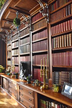 an old library with lots of books on the shelves