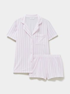 For the most luxurious night’s sleep, the Short Pyjama Set in Pale Pink Stripe print is the ultimate choice. Elevating every night-time ritual, slow Sunday morning and indulgent lazy day, this is comfort like no other. Made from 95% biodegradable TENCEL™ Modal x Micro (AKA trees!). Proven to be more than twice as soft as cotton. Cloud-soft, breathable, feminine, and comfortable. Sustainable nightwear designed by women, for women. One tree planted with every order. Models wear a size M. Mainline - 95% TENCEL™ Modal, 5% Elastane. Lace: 91% Nylon, 9% Elastane. B-Edit - 74% TENCEL™ Modal, 19% SeaCell™ and 10% Roica V550. Soft Brushed Woven - 100% EcoVero Viscose from Lenzing. We recommend washing on a cool, 30 degree wash or by hand. Dry flat and avoid tumble drying. Cute Pajamas For Women, Sleeping Clothes, Pink Sleepwear, Slow Sunday, Duvet Day, Cute Pajama Sets, Pyjama Sets, Sleep Wear, Cap Fashion