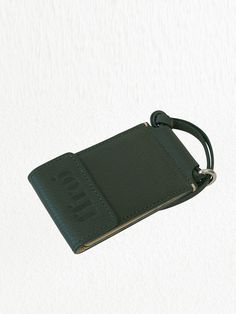 Editor's NotesThis trifold wallet is a daily item that is able to attach other decorations or key rings and has three slot spaces - Maximal embossed logo on the front- Stich line details- Two snap button closure- Five card slots- One compartment for paper- Long sting with metal ring Measurements (in.)Width: 5.11in.Depth: 0.59in.Height: 2.95in. Composition & Care- Goat leather Designer- Made in Korea- by ffroi Travel Coin Purse With Key Clip, Rectangular Travel Wallet With Key Clip, Rectangular Wallets With Key Clip, Rectangular Rfid Blocking Badge Holders For Travel, Rfid Blocking Rectangular Badge Holder For Travel, Leather Rectangular Coin Purse With Key Clip, Rectangular Travel Card Holder With Key Clip, Green Wallet With Interior Key Chain Holder For Travel, Travel Wallet With Interior Key Chain Holder