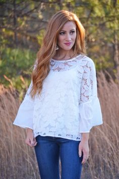 $32.00 Cuteness defined in a sweet little top! Lace brings tons of boho charm to this look while the subtle bell-sleeve adds some pop! Top is unlined, leaving the lace panel sheer, so you will want to layer over a cami for extra coverage! *also available in black Casual Off-white Lace Tops, Chic White Scalloped Lace Top, White Sleeveless Lace Top With Scalloped Lace, Feminine Off-white Lace Top Blouse, Lace Top White, Bohemian Off-white Lace Top, Pop Top, White Lace Top, Lace Panelled