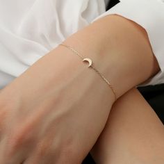 Elegant Rose Gold Moon Phase Jewelry, Elegant Moon Phase Bracelet, Elegant Moon Charm Bracelet, Elegant Gold Moon Phase Bracelets, Elegant Gold Bracelets With Moon Phase, Elegant Everyday Moon Phase Jewelry, Elegant Moon Phase Jewelry For Everyday Wear, Elegant Adjustable Bracelet With Moon Charm, Elegant Adjustable Crescent Jewelry