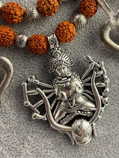 Amazing necklace with Goddess Kali 🙏🏻 The basis of the necklace is rudraksha with metal oriental elements and trisula - an attribute of God Shiva. The necklace is easily adjustable with a string. Maximum length 64 cm, Kali 4 cm x 8 cm.  Earrings - trisula length 6 cm, width 2.5 cm. Hindu Kali, Goddess Of Health, Goddess Kali, Attributes Of God, Thread Necklace, Kali Goddess, Luck Quotes, God Shiva, Indian Outfits