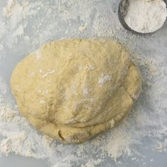 a ball of dough sitting on top of a table