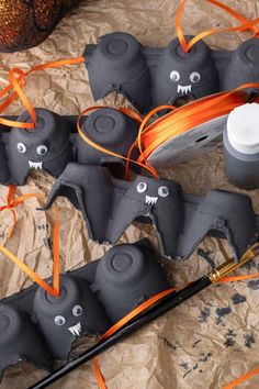 halloween decorations with bats and orange ribbons