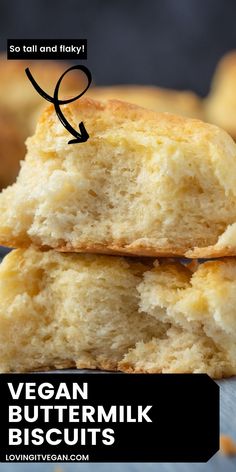 two vegan buttermilk biscuits stacked on top of each other with the text vegan buttermilk biscuits below