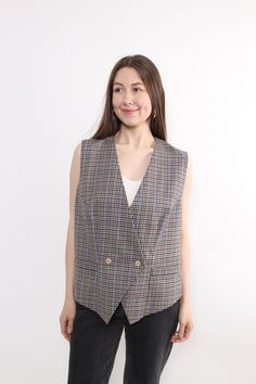 Hi! Welcome to TARASCOMMON.ETSY.COM, your destination for unique clothing from the 20th century! This listing includes a 90s double breasted wool vest in grey color way. This top is perfect for adding a touch of retro charm to your wardrobe. Key Features: 90s wool retro vest Vintage style plaid print vest Size: LARGE. Measurements (taken seam to seam while lying flat): Width: 52cm / 20.48inch Length: 62cm / 24.4inch Material: WOOL / POLYESTER. Additional Information: Please note that these items Retro Sleeveless Outerwear For Work, Retro Spring Vest For Workwear, Vintage Vest For Spring Workwear, Vintage Workwear Vest Top, Vintage Vest Top For Work, Retro Vest, Double Breasted Vest, Wool Vest, Unique Clothing