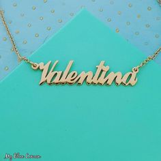 Order any word or name for your new 18k gold plated Valentina heart style nameplate necklace. 🍋 * Nameplate and chain are all solid sterling silver 925 with 18k gold 2 micron double plating. * Your 18k Gold Plated Nameplate will be a strong 1.2 mm thickness.  * The first capital letter of your standard size nameplate, will be 11 mm tall.  * The tiny heart will be placed on the i or j dot. If there is no i or j in your name, I will add the heart at the end of the name.  * I make tiny, small, sta Gold Plated Nameplate Necklace For Anniversary, Customized 14k Gold Name Necklace For Valentine's Day, 14k Gold Name Necklace With Heart Pendant, Gold Plated Name Necklace For Valentine's Day, Valentine's Day Gold Plated Name Necklace, Custom Name Gold-plated Necklace For Mother's Day, Gold Heart Pendant Name Necklace, Custom Name Gold Plated Necklace For Anniversary, Custom Name Gold Plated Necklace As Personalized Gift