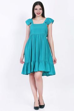 • Perfect for a sunny day out.• Light weight 100% Rayon material.• Short length exudes a youthful and playful vibe. Light Blue Summer Midi Dress For Day Out, Light Blue Summer Midi Dress, Green Breezy Midi Dress For Beach, Turquoise Sundress For Summer, Casual Green Midi Dress For Beach Season, Turquoise Mini Dress For Summer, Casual Turquoise Cotton Dress, Summer Turquoise Sundress For Vacation, Turquoise Sundress For Summer Vacation