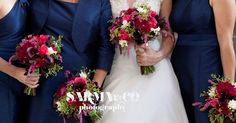 a group of women standing next to each other holding bouquets