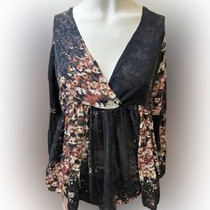 This Crop, Deep V Neck Boho Blouse Is Soft And Feminine With Its Ruffled Bottom And Butterfly Sleeves. Bottle Rock? Coachella? She’s Ready To Go! Mannequin Is Size 2-4 With 33” Bust And It’s Loose. Blouse Retails For Around $159 Black V-neck Printed Blouse, Bohemian V-neck Top For Night Out, Floral Print Long Sleeve Top For Night Out, Long Sleeve Floral Print Tops For Night Out, Black Floral Print Blouse For Fall, Flowy Long Sleeve Tops For Night Out, Flowy Multicolor Party Tops, Flowy Fall Blouse For Night Out, Floral Print V-neck Blouse For Night Out