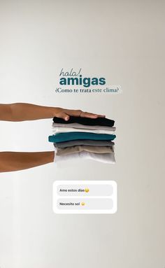 an ad for armgass showing two hands holding folded clothes and pointing at the screen