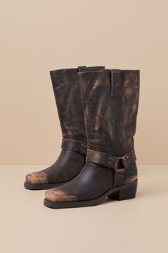 Give any of your 'fits an exceptionally edgy upgrade with the addition of the Steve Madden Rhoda Brown Distressed Leather Mid-Calf Moto Boots! These too-cool boots have a smooth, distressed genuine leather construction that shapes a chic square-toe upper and a 11"" mid-calf shaft with a 14.5"" circumference and pull tabs at either side of the collar. Classic, matching O-rings at the outstep and instep complete the moto-inspired look! 2" block heel. Lightly cushioned insole. Nonskid rubber sole. Genuine Leather Upper. Man Made Materials. Imported. Lulus | Rhoda Brown Distressed Leather Mid-Calf Moto High Heel Boots | Size 7.5. Fall Moto Boots With Reinforced Toe In Oiled Leather, Rugged Oiled Leather Moto Boots With Reinforced Heel, Rugged Leather Moto Boots With Wide Calf, Rustic Moto Boots With Reinforced Toe For Fall, Rustic Reinforced Toe Moto Boots For Fall, Rugged Moto Boots With Leather Sole, Rugged Moto Boots With Reinforced Heel, Rustic Leather Moto Boots With Reinforced Heel, Rugged Leather Moto Boots With Square Toe