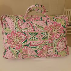 This Limited Edition Beautiful Vera Bradley Large Weekender Bag Is A Must-Have For Any Colorful And Floral-Themed Occasion. This Vera Bradley Is In The Retired Beautiful Pink Pinwheel Pattern. The Bag Features A Colorful Floral Design With Quilted Accents, And Is Made Of Cotton Exterior Material With A Cotton Lining. It Has Double Handles For Easy Carrying, A Detachable Strap That Can Be Adjusted To Your Liking, And A Zip Closure To Keep Your Belongings Secure. With A Size Of 18" Width, 12" Heig Pink Weekender Bag With Luggage Sleeve, Pink Weekender Bag With Luggage Sleeve For Everyday, Pink Rectangular Shoulder Bag For Travel, Pink Travel Bags With Handles, Pink Shoulder Bag With Dust Bag For Travel, Pink Rectangular Travel Bag For Daily Use, Pink Everyday Tote Travel Bag, Pink Rectangular Weekender Bag For Travel, Pink Tote Weekender Bag For On-the-go