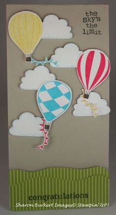 a card with hot air balloons flying in the sky