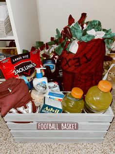 a basket filled with lots of food sitting on top of a floor