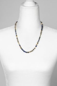 Discover the vibrant and stunning colors of the Blue Moon Collection in this eclectic necklace! Gold Filled (Lead & Nickel Free) Pyrite, Lapis Lazuli, Sodalite, Mother Of Pearl, Labradorite 20.5-22.5" adjustable length, with gold filled lobster claw clasp We hand select our natural materials, thus there may be slight variations in color and/or size that will not detract from the overall aesthetic. Our unique handcrafted designer jewelry for women is made in America, each design created individua Blue Labradorite Necklaces For Healing, Blue Labradorite Gemstone Bead Necklaces, Blue Labradorite Gemstone Beads Necklace, Blue Gemstone Necklace In Labradorite, Blue Labradorite Gemstone Beads Jewelry, Blue Labradorite Jewelry With Gemstone Beads, Blue Labradorite Gemstone Necklace, Blue Labradorite Beaded Jewelry, Artisan Blue Labradorite Necklace