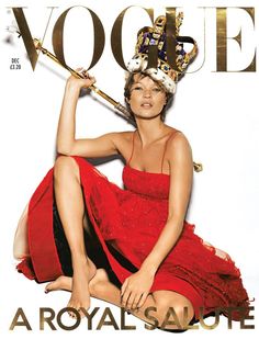 a woman in a red dress is sitting on the cover of a magazine, holding a baseball bat