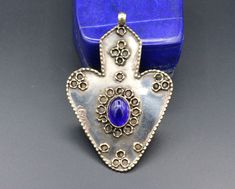 I am offering You Vintage Kazakh traditional carved Asyk heart pendant. Its 100% hand crafted workmanship with Blue glass beads. Please do not hesitate to contact if you have any questions. Weight : 13.3 grams, Length : 2.8" ( 7cm ) Width : 1.8" ( 4.5cm ) Shipping & Estimated Delivery Time With Turkish Registered Post, Destination CountryStandard Shipping (business days) United States          15-20  Europe7-15 Asia15-25  Australia15-20 Brazil & South America Traditional Carved Blue Jewelry, Traditional Handmade Heart Jewelry, Traditional Handmade Heart-shaped Jewelry, Traditional Jewelry For Jewelry Making With Heart Beads, Traditional Heart-shaped Jewelry With Heart Beads, Traditional Handmade Heart Necklaces, Traditional Heart Charm Pendant Jewelry, Pendant Heart, Handmade Heart