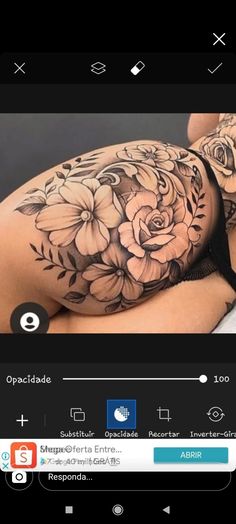 an image of a woman with flowers on her stomach and chest, in the background is a