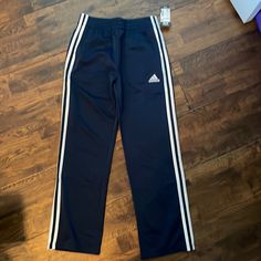 New With Tags Adidas Navy Blue Tricot Track Pants. Adidas Blue Sporty Sweatpants, Adidas Sporty Blue Sweatpants, Adidas Blue Sweatpants For Sports, Adidas Blue Cotton Pants, Blue Adidas Cotton Sweatpants, Adidas Blue Cotton Sweatpants, Navy Adidas Sporty Pants, Adidas Navy Sporty Pants, Adidas Blue Sweatpants With Pockets